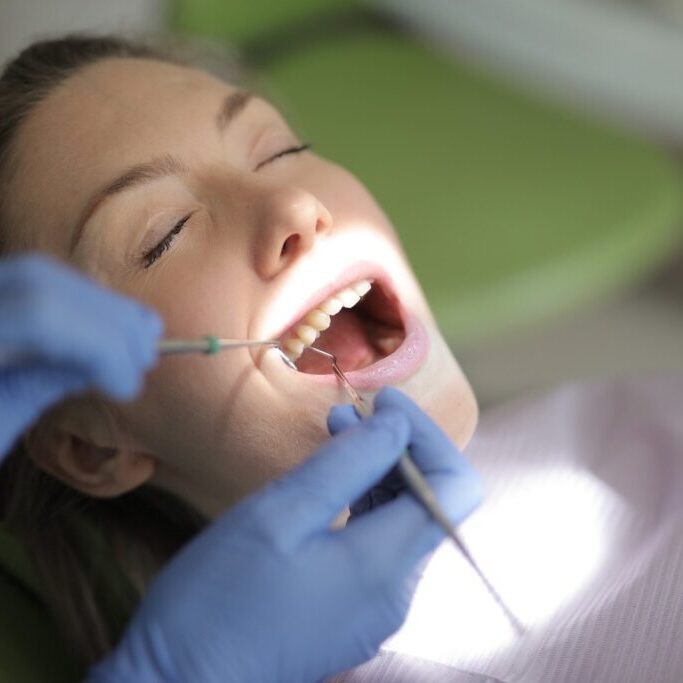 MAD2ZoQWpiY woman in dentist chair